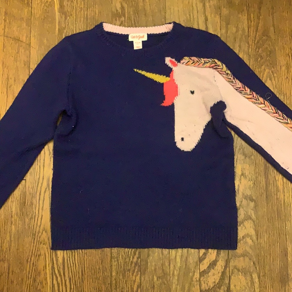 Cute navy blue sweater with adorable pink unicorn